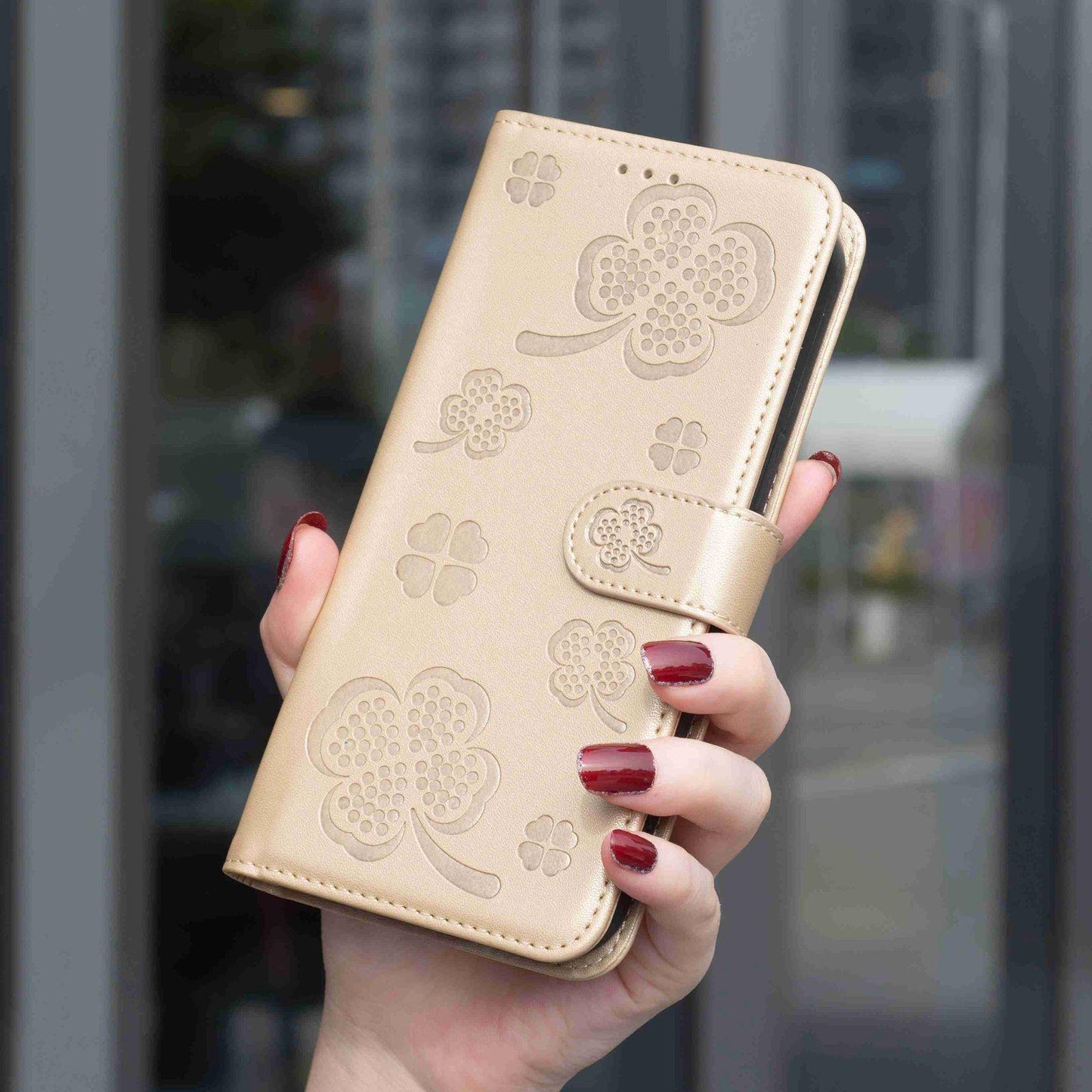 For Redmi Note 17 4G Global 171mm Four-leaf Embossed Leather Phone Case(Gold)