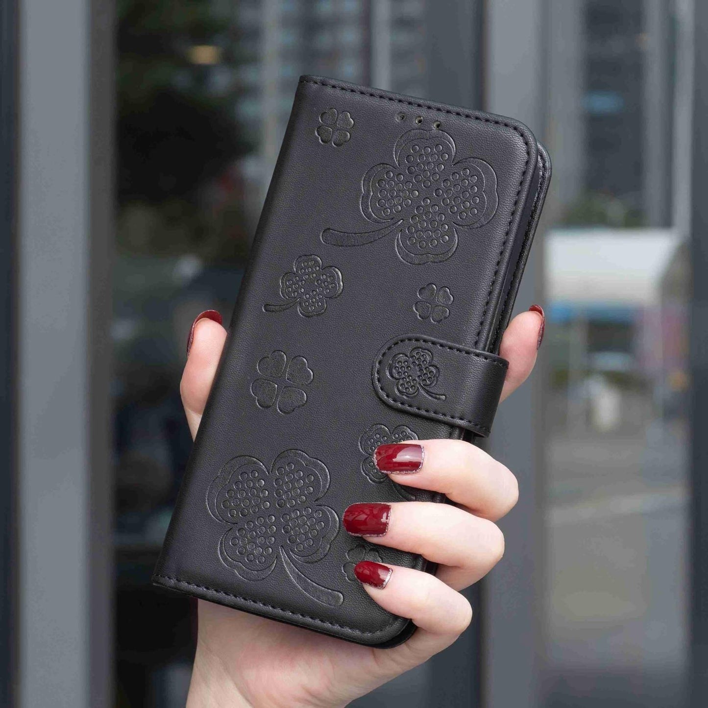 For Redmi 17 4G / 5G Global 170mm Four-leaf Embossed Leather Phone Case(Black)