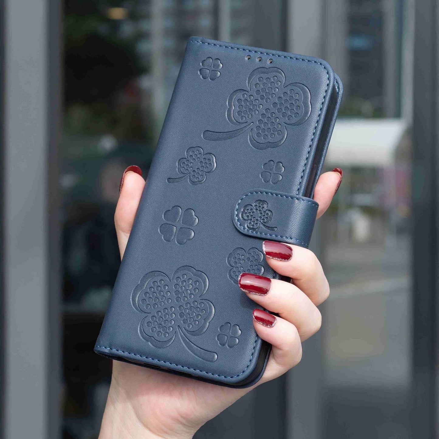 For Redmi Note 17 4G Global 171mm Four-leaf Embossed Leather Phone Case(Blue)