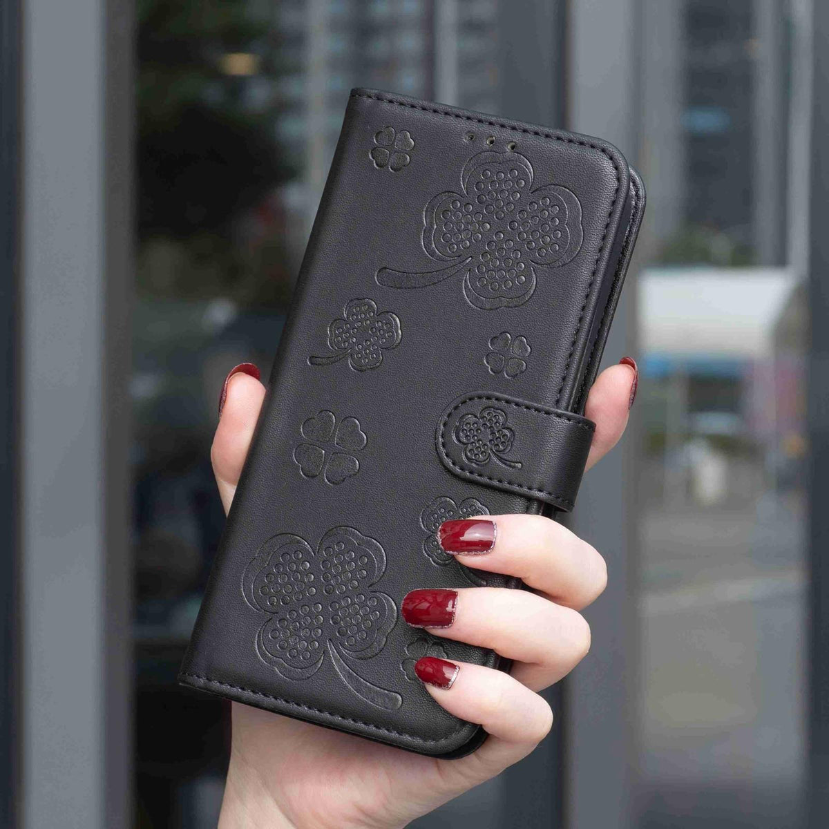 For Infinix GT 50 Pro 5G Four-leaf Embossed Leather Phone Case - Black - EDA009733201C