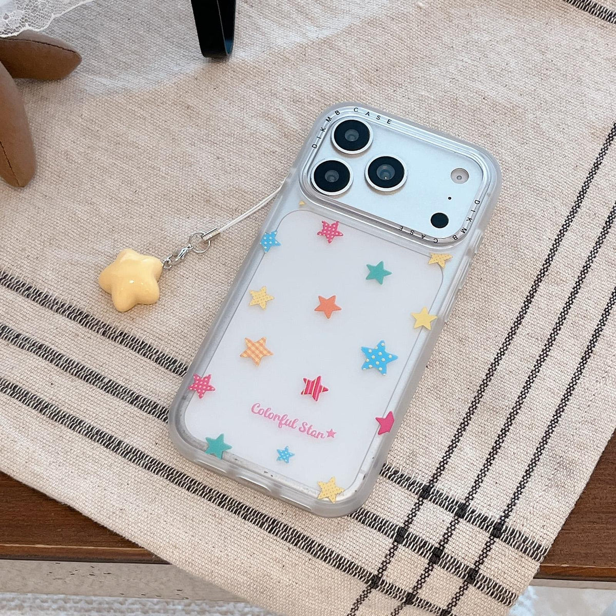 For iPhone 16 Skin Feel Frosted Cartoon Sticker Acrylic Phone Case with Pendant - Colorful Stars - EDA009740506A