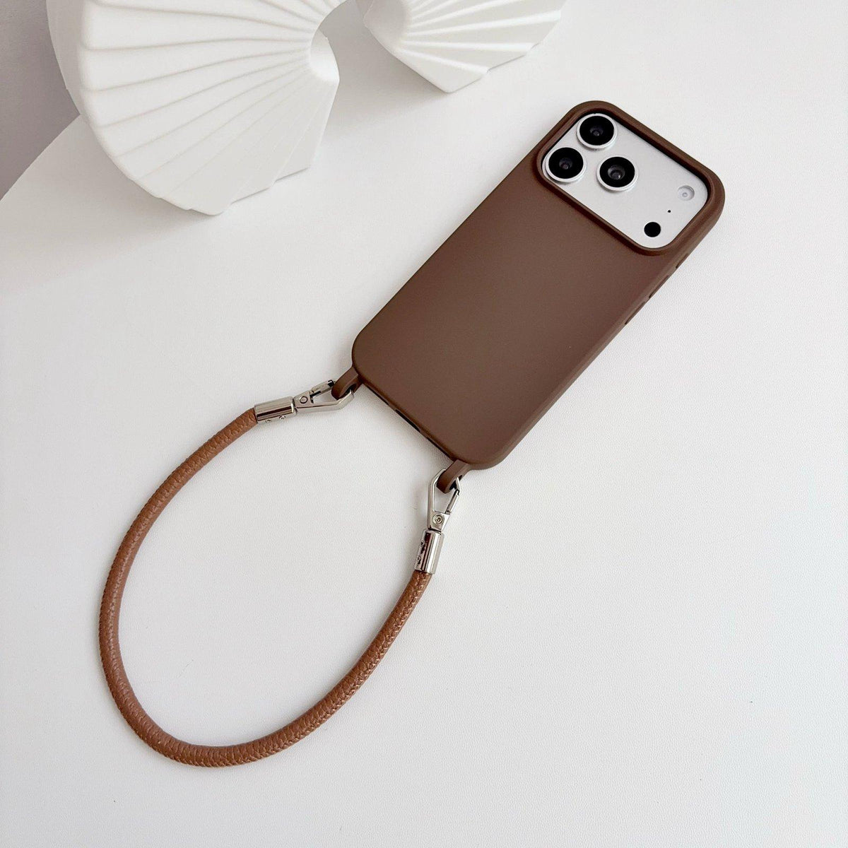 For iPhone 16 Pro Integrated Lanyard Loops Shockproof Silicone Phone Case with Leather Hand Lanyard - Coffee - EDA009745906C