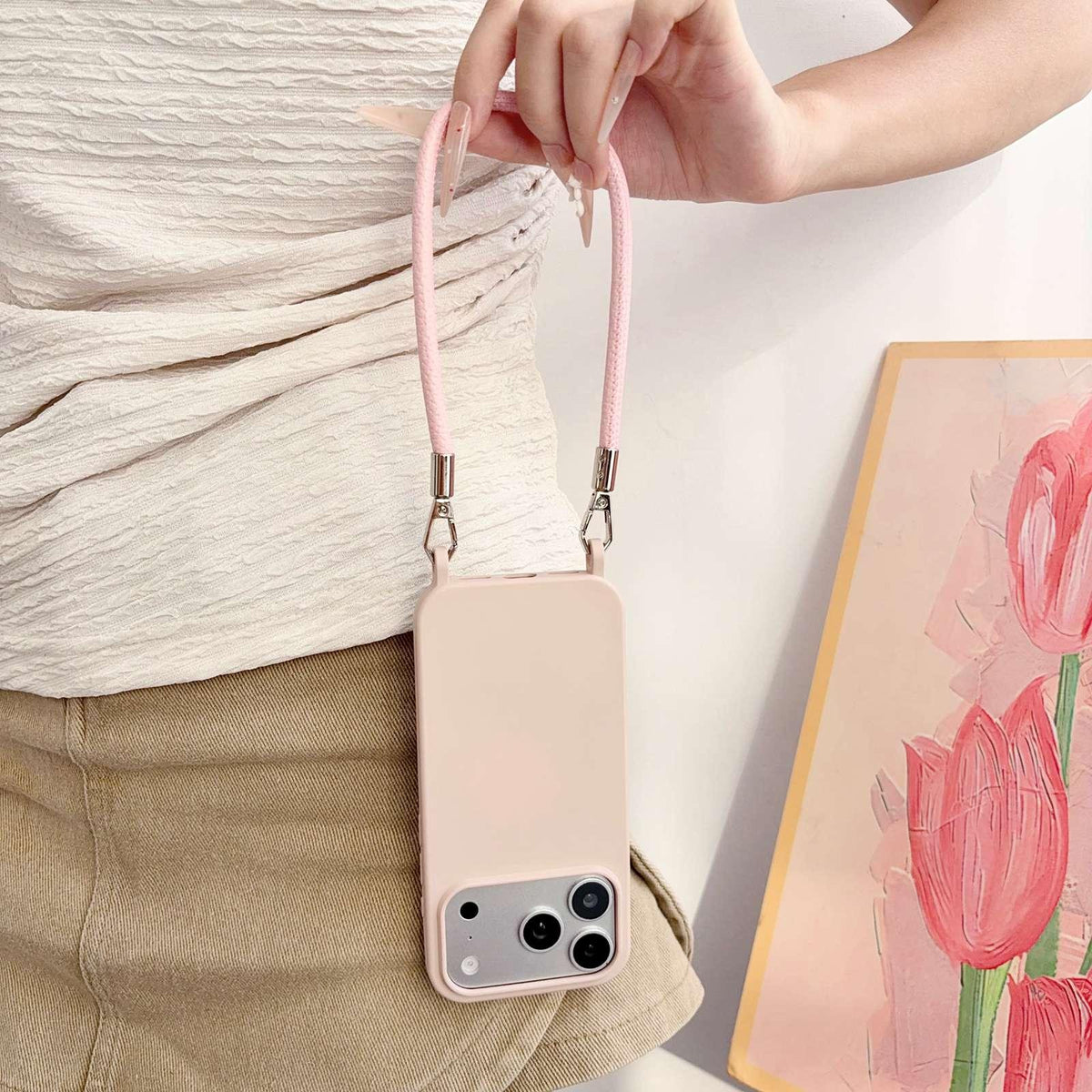 For iPhone 16 Pro Integrated Lanyard Loops Shockproof Silicone Phone Case with Leather Hand Lanyard - Pink - EDA009745906E