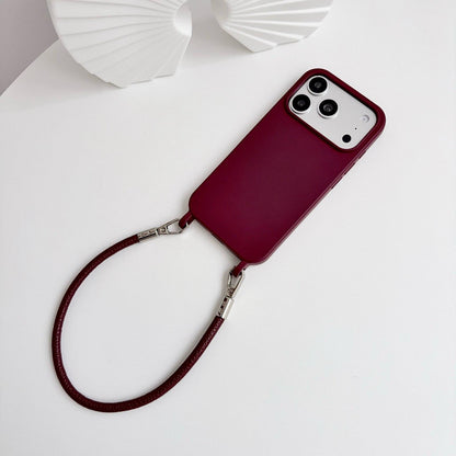 For iPhone 16 Pro Integrated Lanyard Loops Shockproof Silicone Phone Case with Leather Hand Lanyard - Wine Red - EDA009745906H