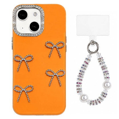 For iPhone 15 Electroplated Bowknot Dopamine Color Skin-Friendly IMD Phone Case with Beaded Wrist Strap - Orange - EDA009772612E