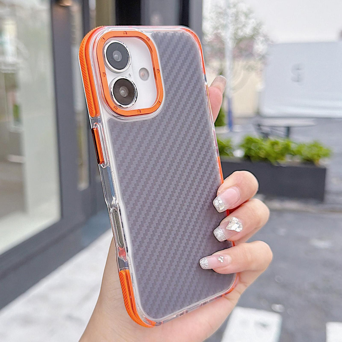 For iPhone 17 Dual-Color Carbon Fiber Texture Acrylic Hybrid TPU Phone Case - Orange - EDA009831603A