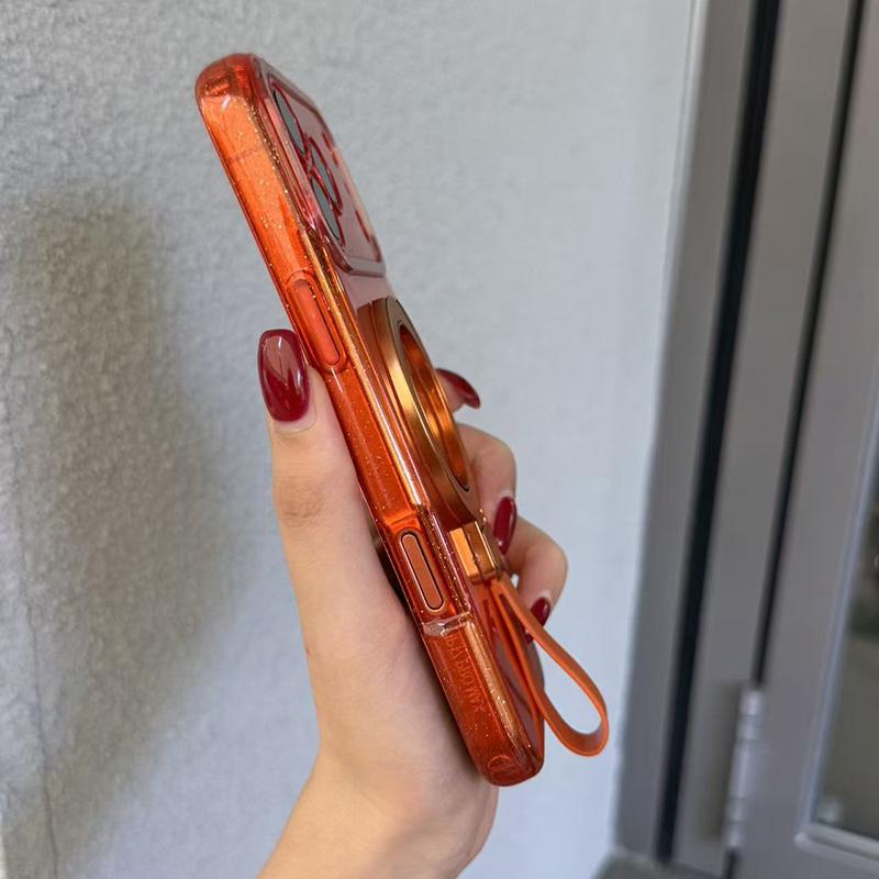 For iPhone 15 Pro Max Glitter Letter Lens Frame Magnetic Phone Case with Holder - Orange - EDA009979709C