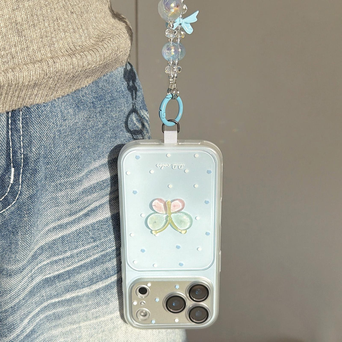 For iPhone 17 Pro Dots Pattern 3D Butterfly Decor Phone Case with Bracelet - White - EDA009988202D