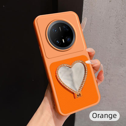 For Huawei Mate 70 Pro Lambskin Series Skin Feel Shockproof Phone Case with Heart Mirror Holder(Orange)
