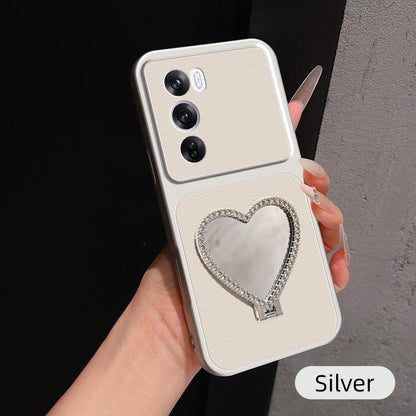 For OPPO Reno12 Pro Global Lambskin Series Skin Feel Shockproof Phone Case with Heart Mirror Holder(Silver)