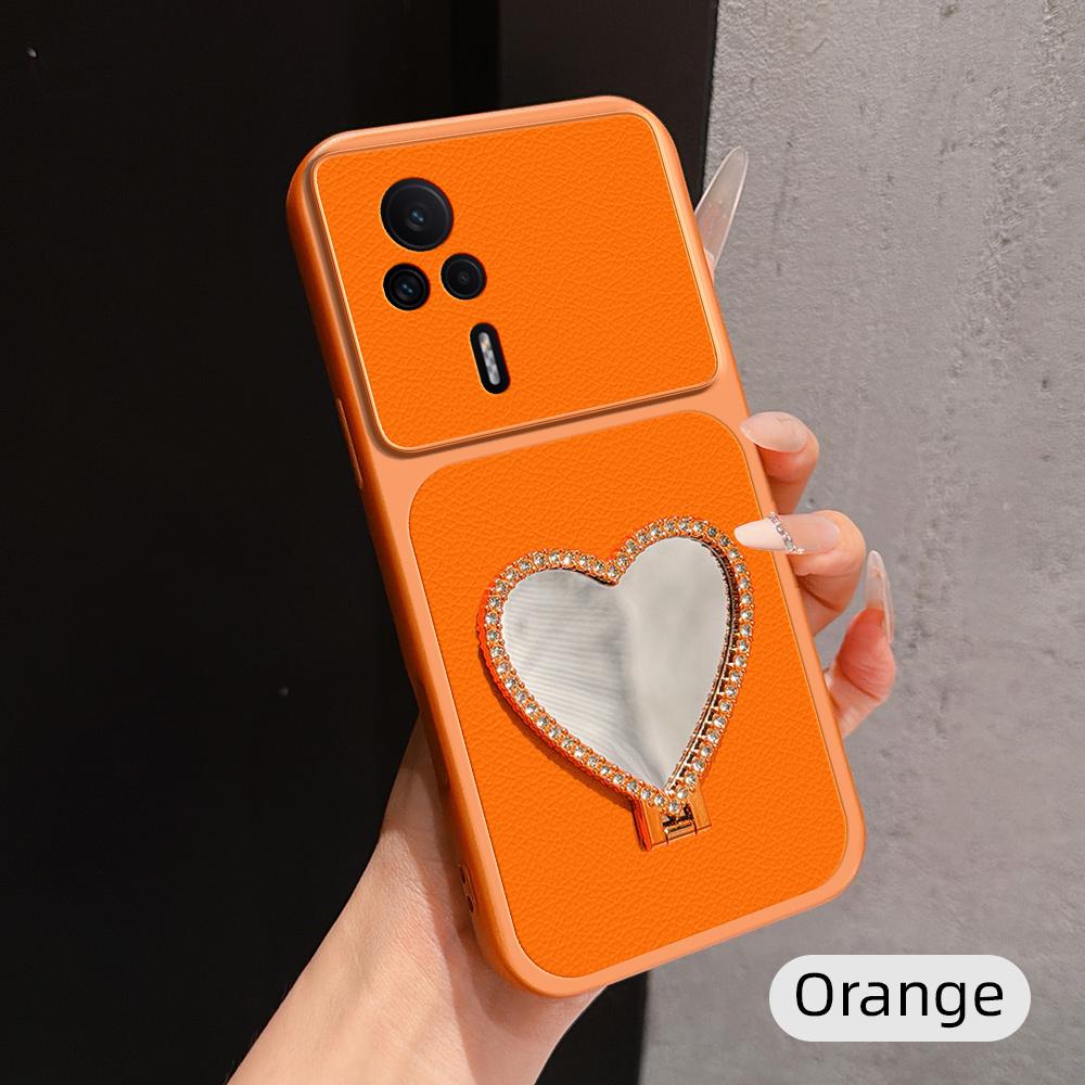 For Redmi K60E Lambskin Series Skin Feel Shockproof Phone Case with Heart Mirror Holder(Orange)