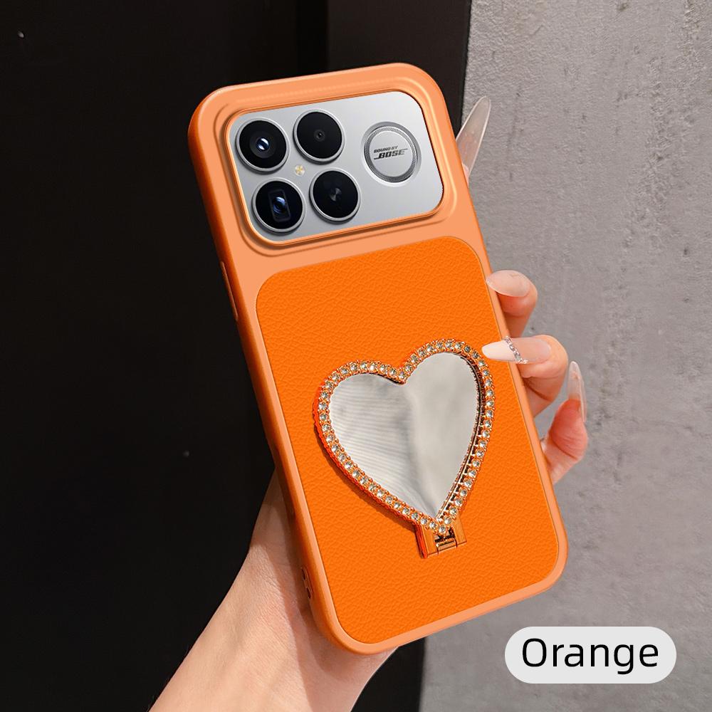 For Redmi K90 Pro Max Lambskin Series Skin Feel Shockproof Phone Case with Heart Mirror Holder(Orange)