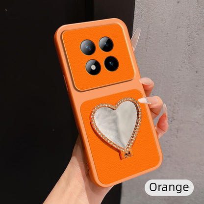 For Redmi Note 15 Pro+ 5G Global 163.3mm Lambskin Series Skin Feel Shockproof Phone Case with Heart Mirror Holder(Orange)