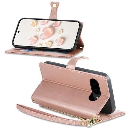 For Google Pixel 9a Zipper Wallet Heart Buckle Vegan Leather Phone Case with Wrist Strap(Pink)