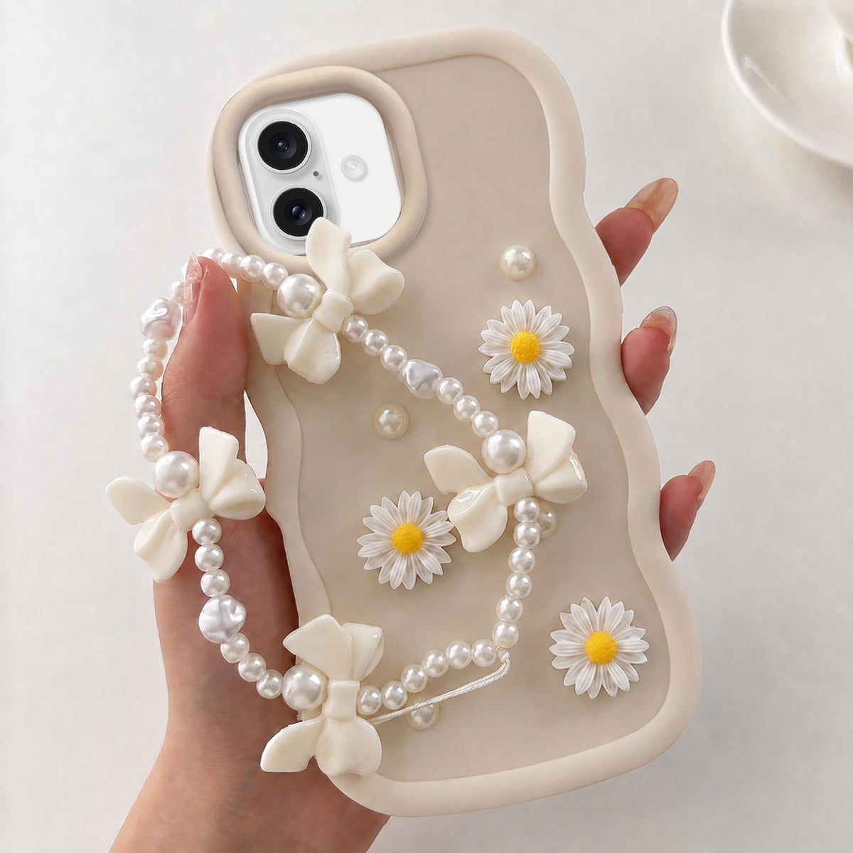 For iPhone 16 Macaron Color Little Daisy and Pearl Phone Case with Bracelet Chain - White - EDA010167102E