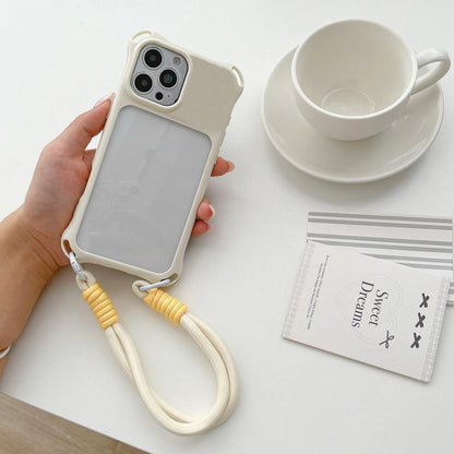For iPhone 15 Pro Four-corners Lanyard Holes Acrylic Hybrid TPU Phone Case with Hand Strap - White - EDA010223410A