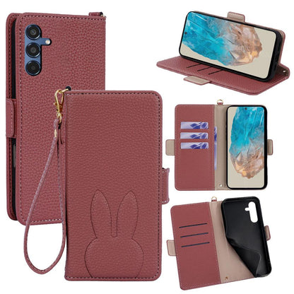 For Galaxy M35 5G Bunny Ears Side Magnetic Clasp Vegan Leather Phone Case with Wrist Strap - Red - EDA010244806D