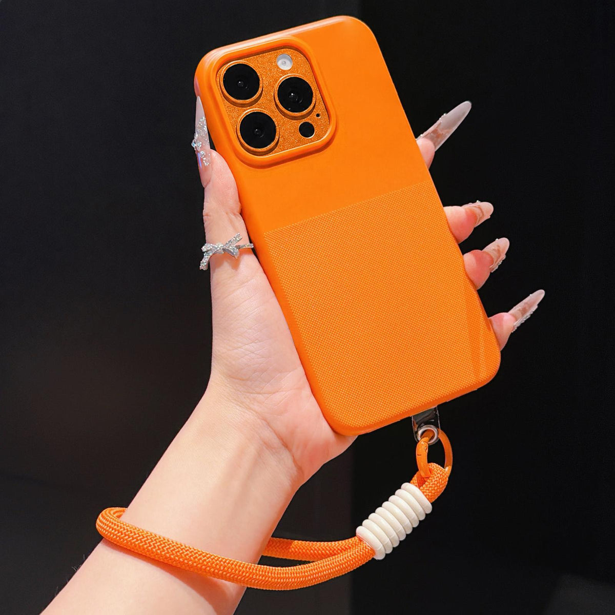 For iPhone 12 Pro Max Imitation Dot-texture TPU Phone Case with Strap - Orange - SYA003421021B